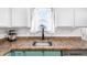 Kitchen sink and countertop with stainless steel dishwasher at 2728 Renshaw St, Strasburg, CO 80136