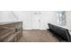 Living room with sofa and view of entryway at 2728 Renshaw St, Strasburg, CO 80136