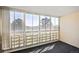 This is a view of the enclosed balcony with large windows at 350 S Clinton St # 8C, Denver, CO 80247