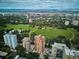 A scenic aerial view of a condo in a park-like setting, with beautiful mountain views at 1133 Race St # 8 & 9 B, Denver, CO 80206