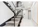 Elegant staircase with glass railings and modern design at 1133 Race St # 8 & 9 B, Denver, CO 80206