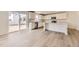 Modern kitchen with stainless steel appliances, stylish cabinets, and a convenient island layout at 22014 E 39Th Ave, Aurora, CO 80019