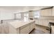 Spacious kitchen with a center island, stainless steel appliances, and an open layout at 22014 E 39Th Ave, Aurora, CO 80019