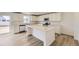 Well-lit kitchen featuring a large island, modern appliances, and ample cabinet space at 22014 E 39Th Ave, Aurora, CO 80019