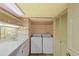 Functional laundry room equipped with a utility sink, a washer, and a dryer at 2800 S University Blvd # 1, Denver, CO 80210