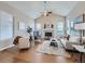 Bright living room with vaulted ceilings, fireplace, and hardwood floors at 12953 Bridge View Ln, Parker, CO 80134