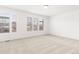 Empty bedroom with neutral carpeting and large windows at 63 S Jackson St, Denver, CO 80209