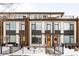 Contemporary three-story townhome with modern exterior finishes at 63 S Jackson St, Denver, CO 80209