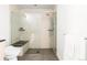 Large walk-in shower with a built-in bench seat at 63 S Jackson St, Denver, CO 80209