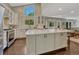 Modern kitchen with marble countertops, stainless steel appliances, and a large center island at 970 Bend In The Trail Rd, Monument, CO 80132