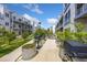 Outdoor grilling area with picnic tables and planters at 2525 Arapahoe St # Rd108, Denver, CO 80205