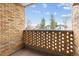 Private balcony with brick wall and city views at 2525 Arapahoe St # Rd108, Denver, CO 80205