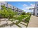 Communal courtyard with lawn, trees, and walkway at 2525 Arapahoe St # Rd108, Denver, CO 80205