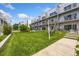 Relaxing courtyard with grassy area and hanging chairs at 2525 Arapahoe St # Rd108, Denver, CO 80205