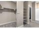 Large walk-in closet with shelving and hanging rods at 2525 Arapahoe St # Rd108, Denver, CO 80205