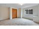 Finished basement with carpet, window, and closet at 7845 Barbara Ann Dr # J, Arvada, CO 80004