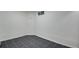 Spacious basement area with tiled floors and a small window at 7845 Barbara Ann Dr # J, Arvada, CO 80004