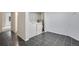 Bright laundry room with tile flooring, washer, and dryer ready for easy chore days at 7845 Barbara Ann Dr # J, Arvada, CO 80004