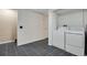 Laundry room featuring tile floors and washer-dryer hookups at 7845 Barbara Ann Dr # J, Arvada, CO 80004