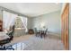 Versatile bedroom or office space featuring a large window and neutral carpet at 20120 Doewood Dr, Monument, CO 80132