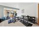 A home gym featuring exercise equipment and natural lighting from a large window at 20120 Doewood Dr, Monument, CO 80132