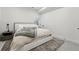 Serene bedroom featuring a plush bed, neutral color palette, and minimalist decor at 380 S Humboldt St, Denver, CO 80209