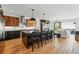 Open kitchen with an eat-in island, stainless steel appliances, and view of the living area at 380 S Humboldt St, Denver, CO 80209