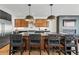 Kitchen boasts a large island with seating, modern appliances, and custom cabinetry at 380 S Humboldt St, Denver, CO 80209