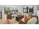 Bright living room with hardwood floors, lots of natural light and a patio and outdoor furniture at 380 S Humboldt St, Denver, CO 80209