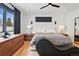 Comfortable main bedroom featuring hardwood floors, natural light, and modern furnishings at 380 S Humboldt St, Denver, CO 80209