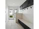 Well-organized mudroom featuring built-in storage, bench seating, and convenient hooks at 380 S Humboldt St, Denver, CO 80209