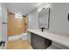 Stylish bathroom featuring a glass shower and modern vanity at 6526 S Elmwood St, Littleton, CO 80120