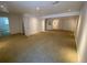 Spacious basement with carpet flooring, neutral paint, and recessed lighting at 540 S Forest St # A2, Denver, CO 80246