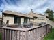 Back deck with outdoor seating and a grill, ideal for enjoying outdoor meals and gatherings at 540 S Forest St # A2, Denver, CO 80246