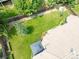 Expansive backyard with lush lawn and mature landscaping, highlighted by a charming gazebo and covered patio at 1735 Crestone Dr, Longmont, CO 80504
