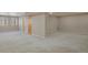 Spacious living room with neutral carpet and natural light is ready for you to make it your own at 1735 Crestone Dr, Longmont, CO 80504