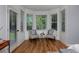 Cozy sitting area with great natural light and comfortable seating off the main bedroom at 1735 Crestone Dr, Longmont, CO 80504