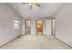 Large bedroom with three door access and natural light at 6202 Ralston St, Frederick, CO 80530