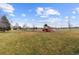 Community playground with slides, swings, and climbing structures surrounded by grassy fields and open space at 6202 Ralston St, Frederick, CO 80530