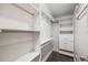 Organized walk-in closet features shelving and drawers, providing plenty of storage solutions at 7790 Kendall St, Arvada, CO 80003