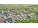 Aerial view of the home in a community with green spaces at 6912 Sunstrand Ct, Castle Pines, CO 80108