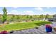 Landscaped backyard with fence, lawn, and patio area, offering a private outdoor living space at 6912 Sunstrand Ct, Castle Pines, CO 80108