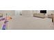 Finished basement area with plush carpeting and ample space for recreational activities and relaxation at 6912 Sunstrand Ct, Castle Pines, CO 80108