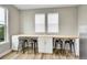 Breakfast nook features built-in cabinets and butcher block countertop and barstool seating at 6912 Sunstrand Ct, Castle Pines, CO 80108