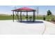 Community gazebo includes picnic tables and built in grills for outdoor gatherings and recreation at 18708 E 99Th Ave, Commerce City, CO 80022
