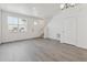 Open floor plan with luxury vinyl plank flooring and lots of natural light at 18708 E 99Th Ave, Commerce City, CO 80022