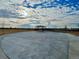 Community park featuring a gazebo with tables and a paved area at 18708 E 99Th Ave, Commerce City, CO 80022
