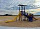 Community playground with slides and other playground equipment at 18708 E 99Th Ave, Commerce City, CO 80022
