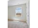 A bright bedroom with a large window, offering natural light at 1923 Westport Ave, Berthoud, CO 80513