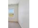 Bedroom featuring a bright window with outdoor views at 1923 Westport Ave, Berthoud, CO 80513